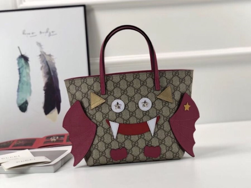 G*u*i shopping bags